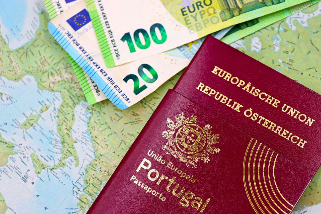 Mastering the First Impression: Your intriguing post title goes here Portugal and Austria passports displayed with Euro currency notes on European map background.